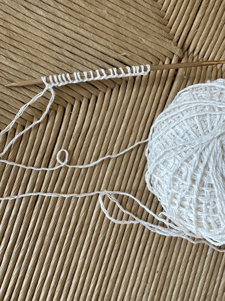 Close-up of yarn and a knitting needle.
