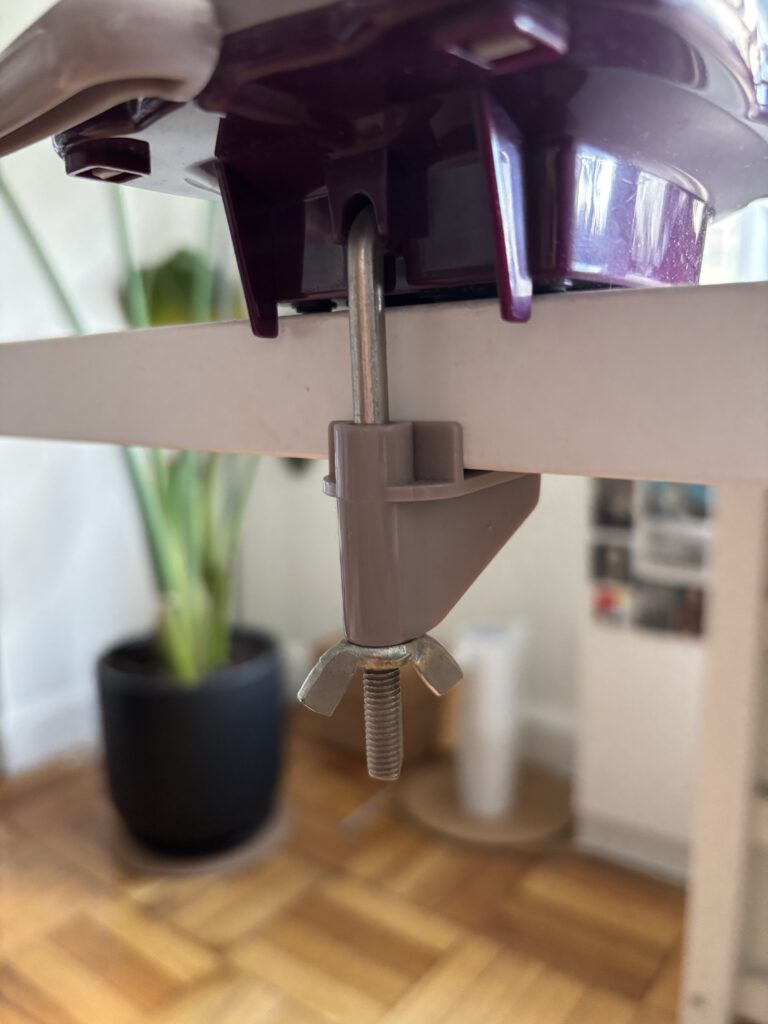 Yarn winder fastened to a table